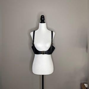 Free People harness. Brand new and never worn. Has distressing which is the look